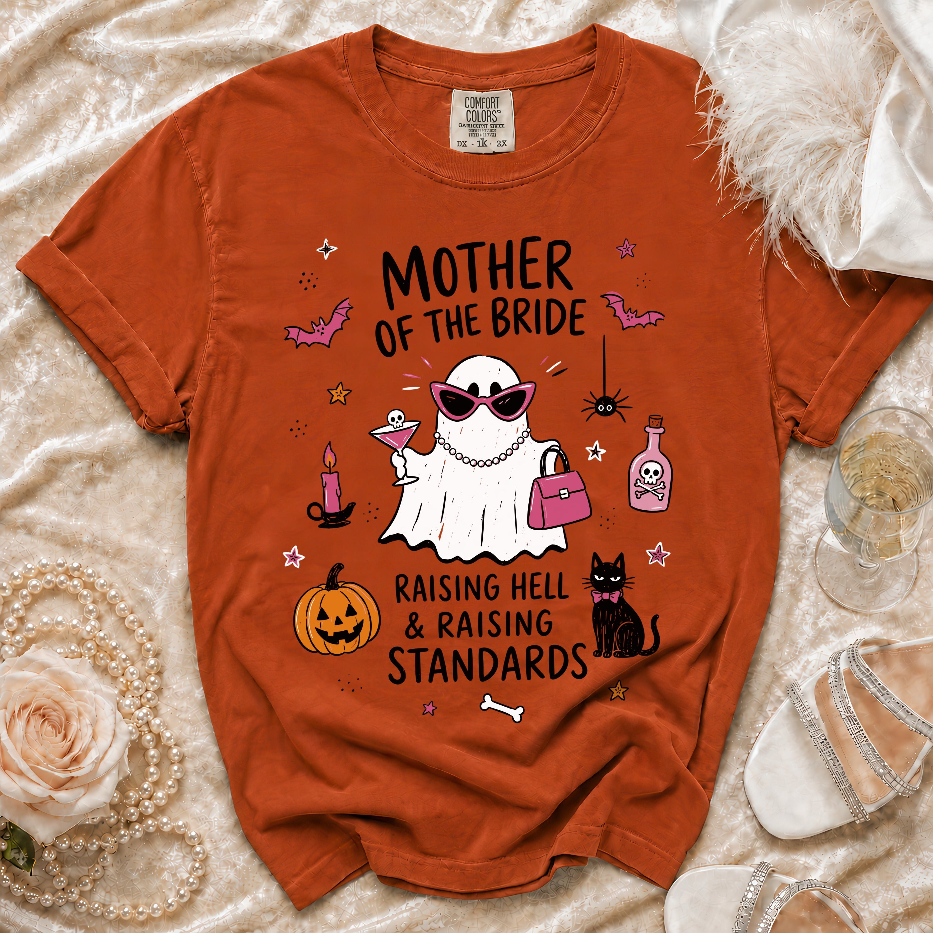 Orange t-shirt with "Mother of the Bride" text and a ghost graphic.