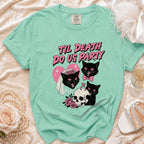 Mint green t-shirt with black cats, skull, and "Til Death Do Us Party" text.