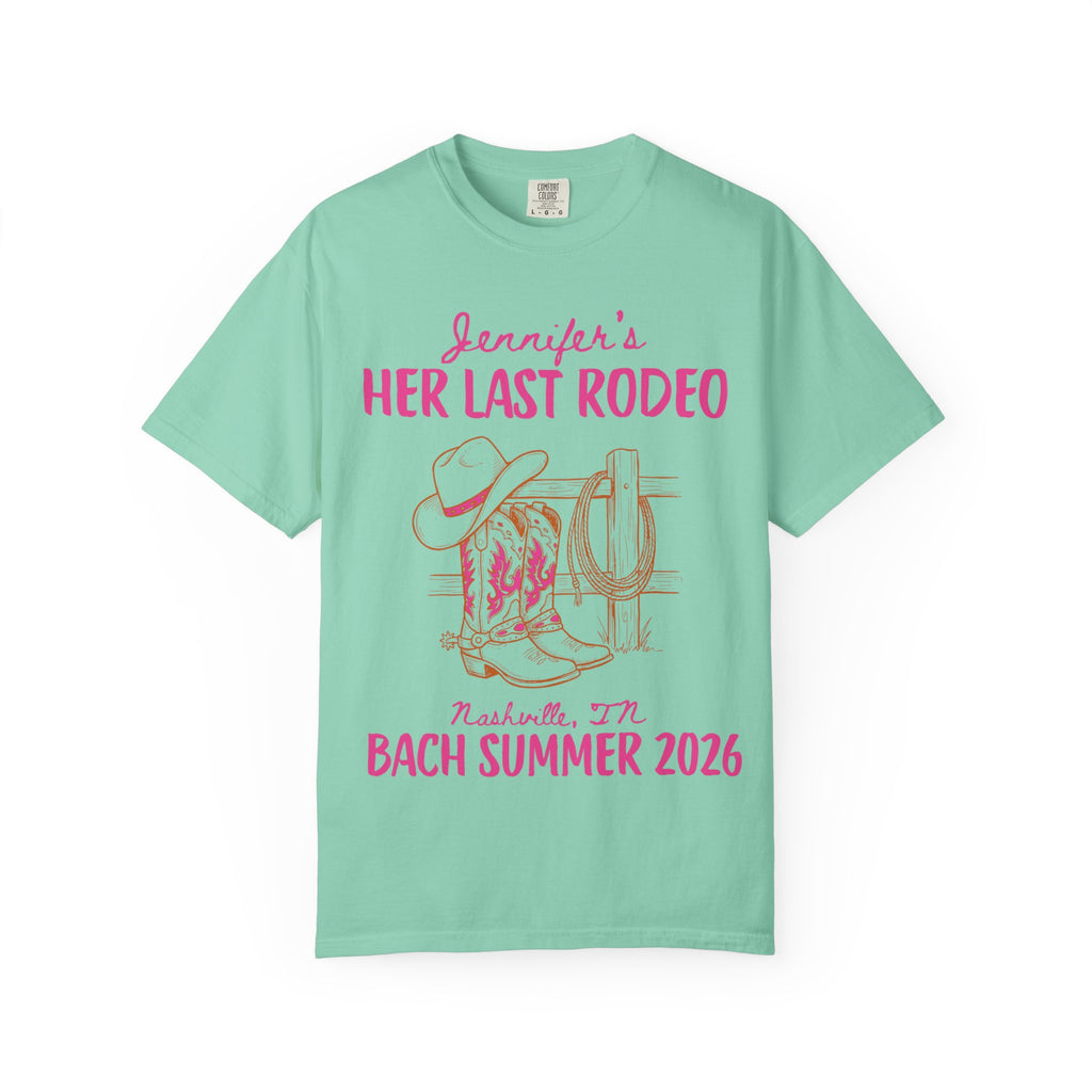 Mint t-shirt with "Jennifer's Her Last Rodeo" and Nashville, IN Bach Summer 2026 text.