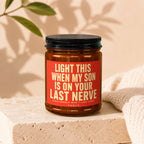 Amber candle with red label reading "Light this when my son is on your last nerve."