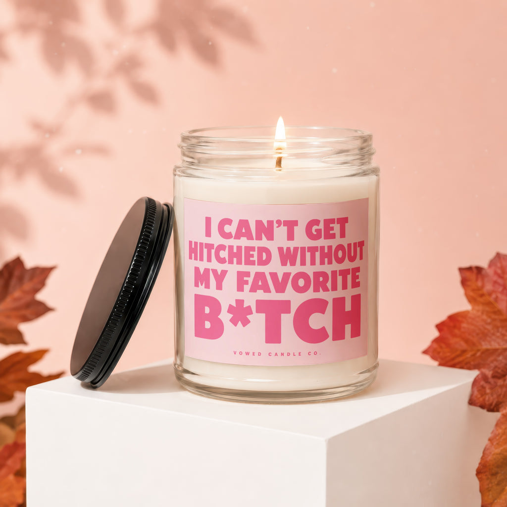 Glass candle with "I CAN'T GET HITCHED WITHOUT MY FAVORITE B*TCH" text.