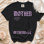 Black t-shirt with "MOTHER OF THE BRIDE" text and witchy graphics.