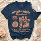 Navy t-shirt with "Mother of the Bride Department" text and Halloween-themed graphic.