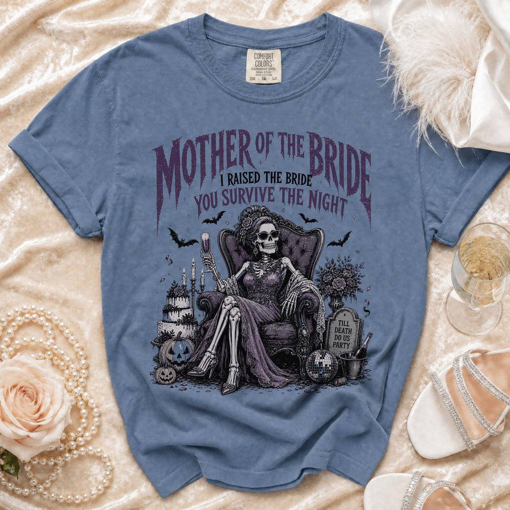 Blue Comfort Colors t-shirt with "Mother of the Bride" skeleton graphic and text.