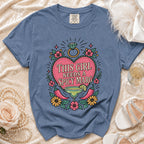 Blue t-shirt with a heart graphic reading "This Girl Needs A Spicy Marg".