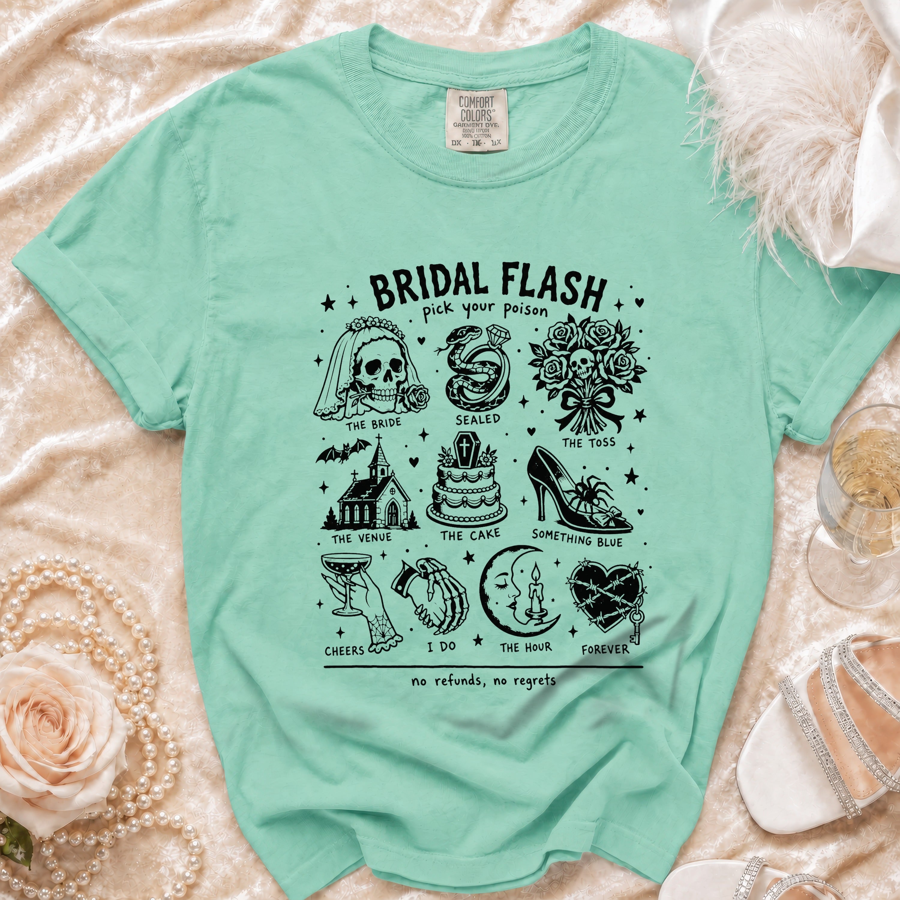 Mint green t-shirt with "Bridal Flash" graphic of wedding icons and text.