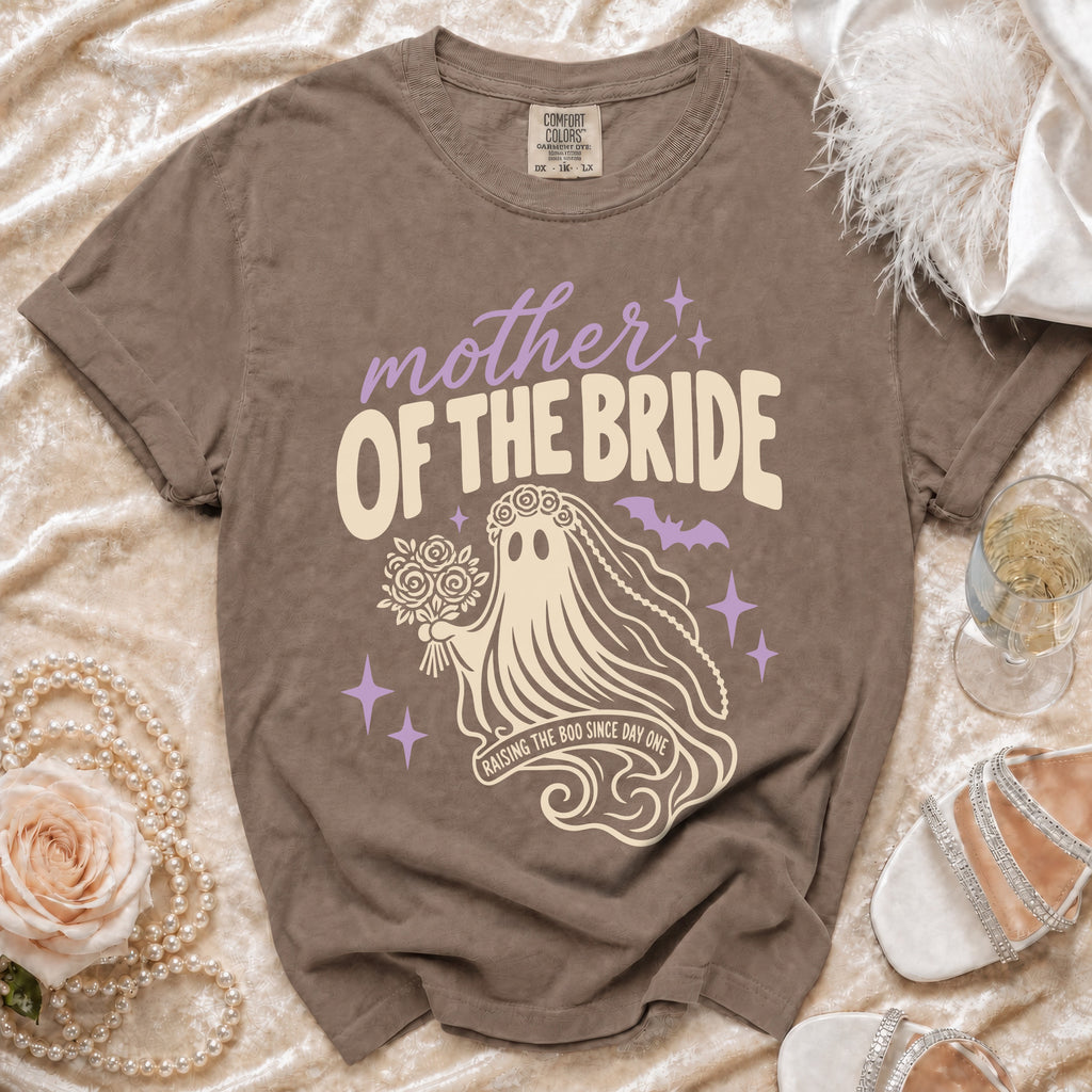 Brown t-shirt with "mother OF THE BRIDE RAISING THE BOO SINCE DAY ONE" and ghost graphic.