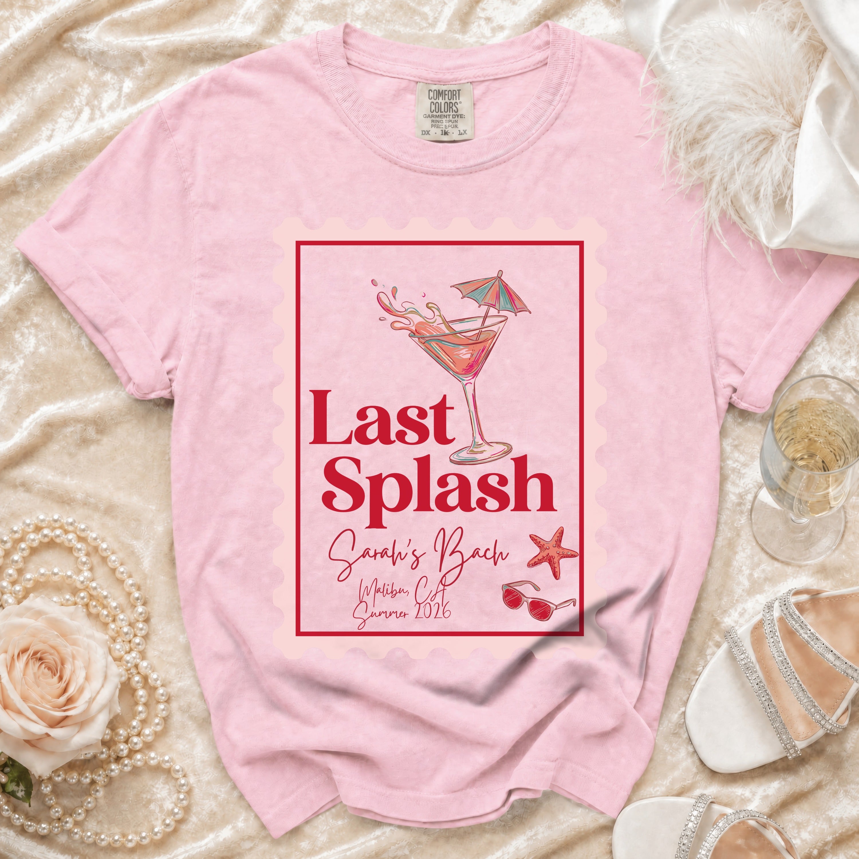 Pink t-shirt with "Last Splash Sarah's Bach" and beach graphics.