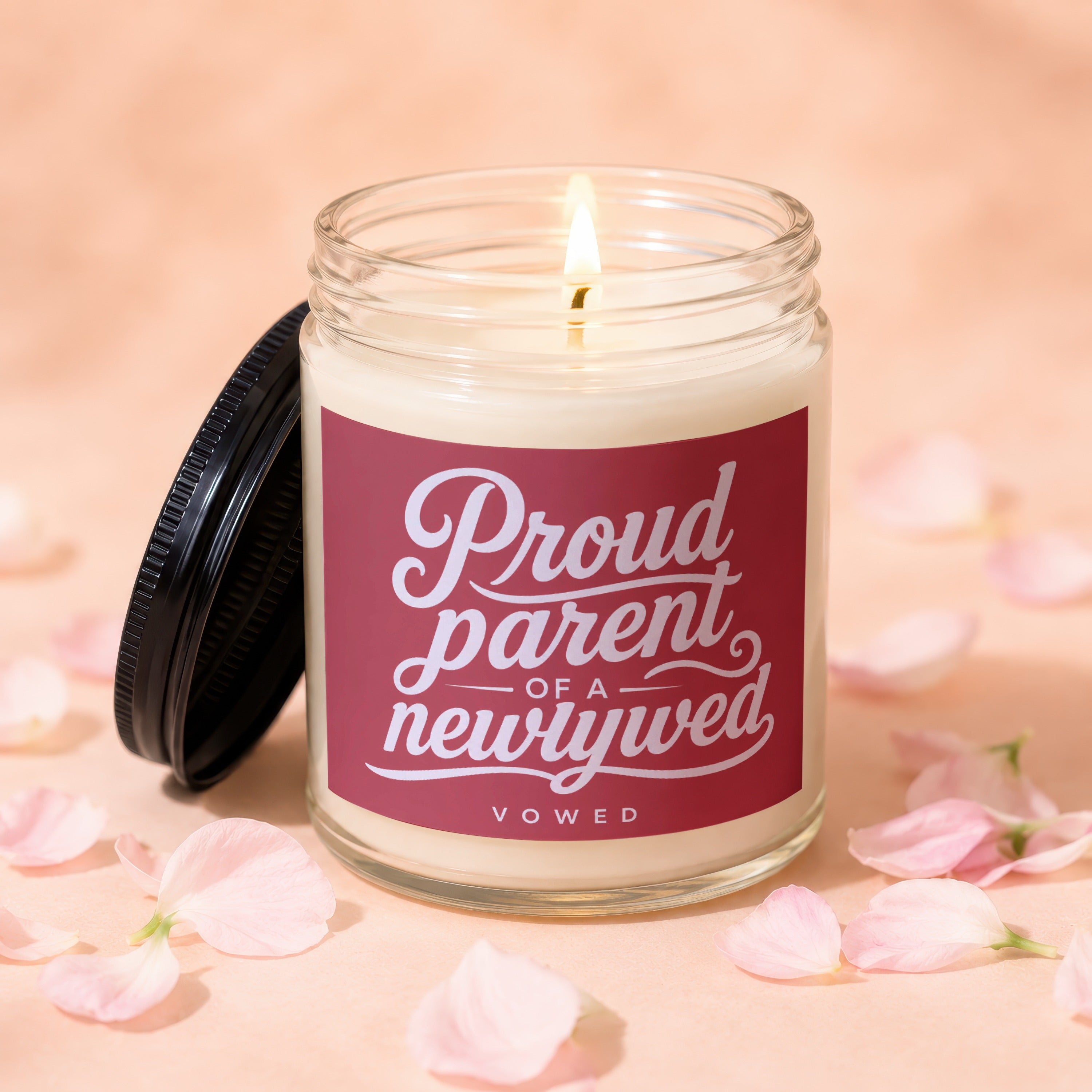 Candle with lit wick and title "Proud Parent of a Newlywed Vowed".