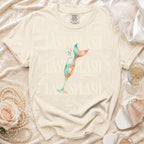 Cream t-shirt with "LAST SPLASH" and mermaid tail in champagne glass.