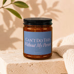 Amber candle with black lid and blue label reading "CAN'T DO THIS Without My Person"