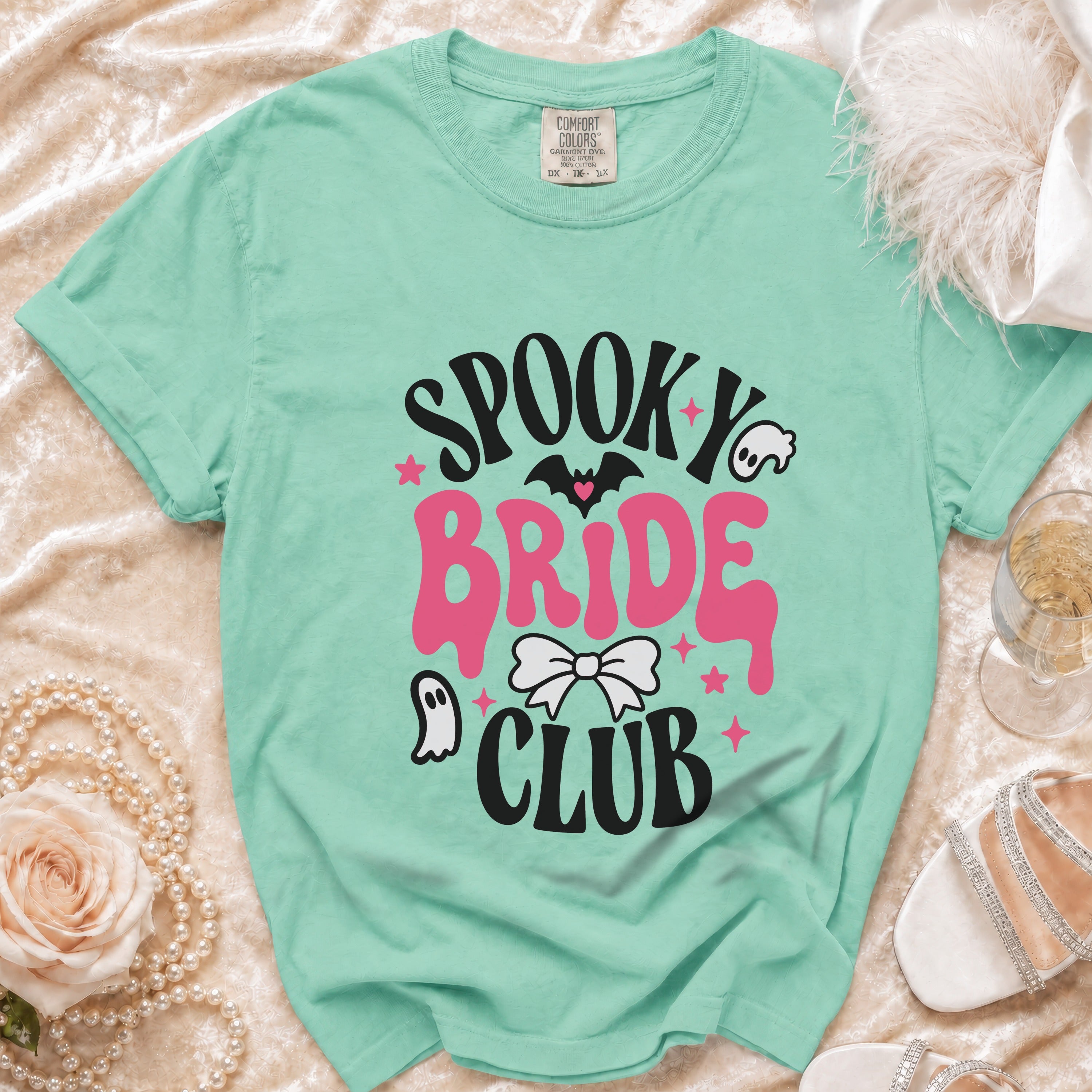 Mint green t-shirt with "Spooky Bride Club" text in black and pink.