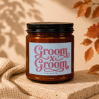Amber candle with "Groom x Groom Vowed" label on textured stone.