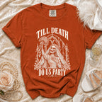 Orange t-shirt with skeleton bride graphic that says "Till Death Do Us Party."