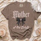 T-shirt with "Mother of the Bride" text, a bow, and a cross.