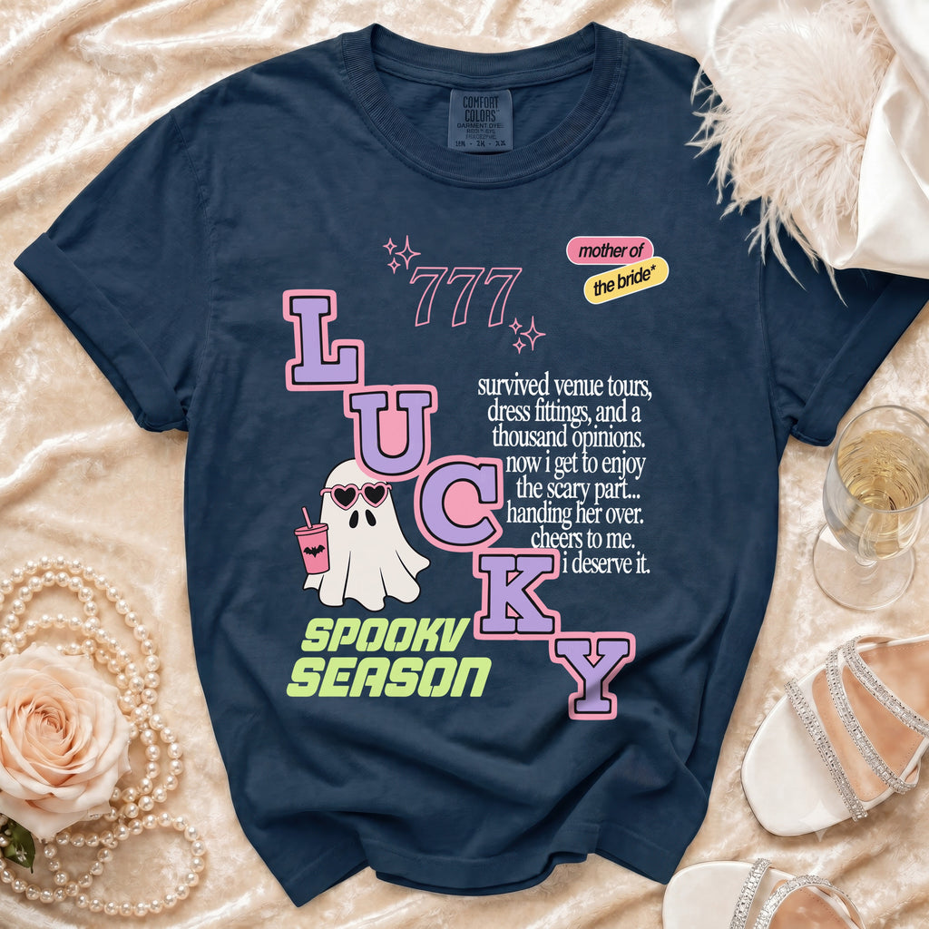 Navy t-shirt with "Lucky Spooky Season" and "mother of the bride" graphics.