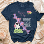 Navy t-shirt with "Lucky Spooky Season" and "mother of the bride" graphics.