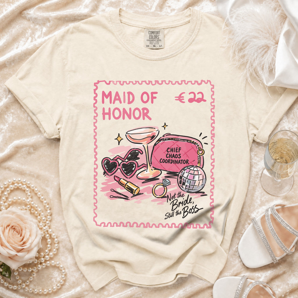 Cream t-shirt with "Maid of Honor" graphic and "Still the Boss" text.