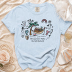 Light blue t-shirt with "The Honeymoon Mode: Do Not Disturb" text and coconut graphics.