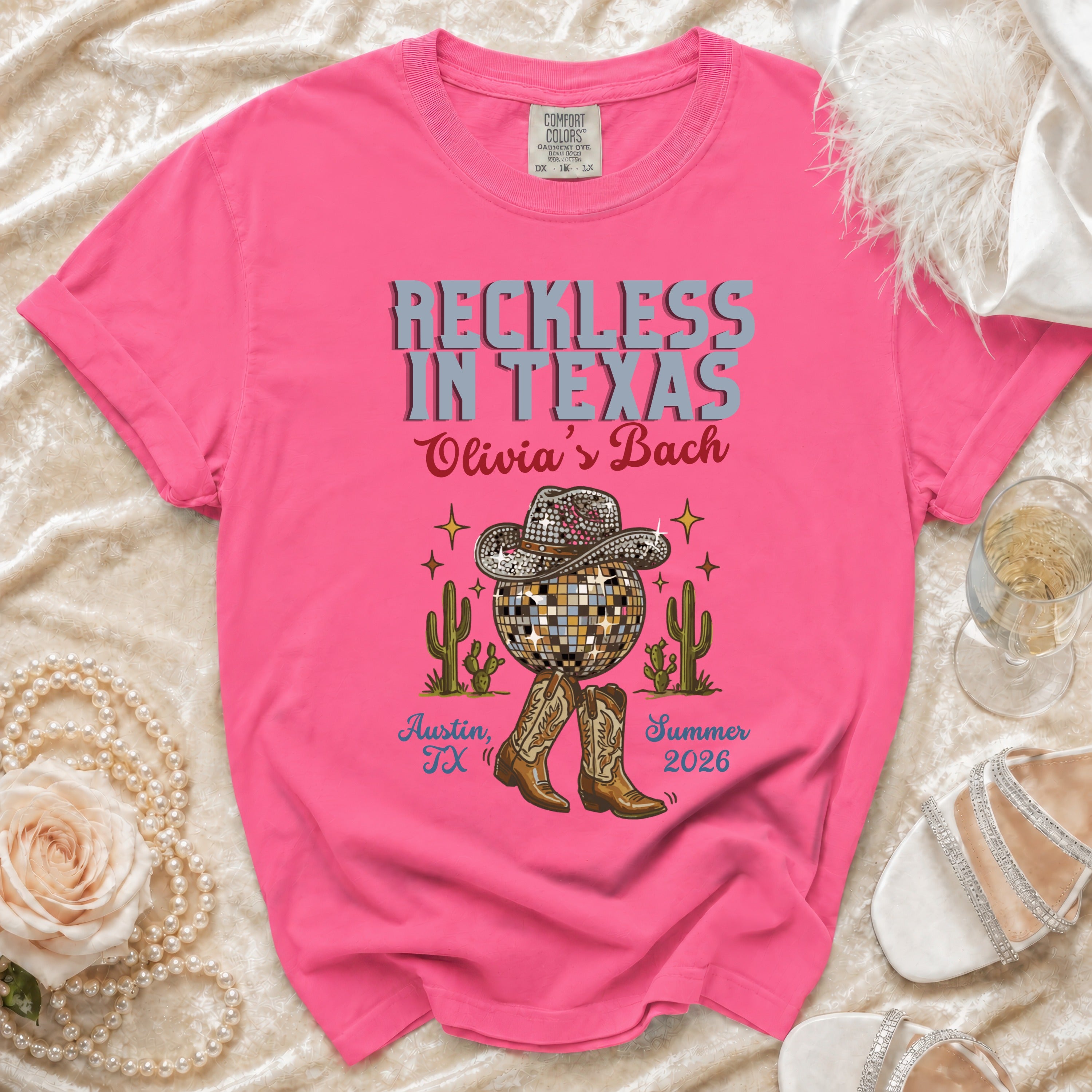 "Reckless in Texas" t-shirt with disco ball, cacti, and boots, "Olivia's Bach Austin, TX Summer 2026".