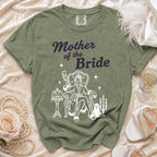 Green t-shirt with "Mother of the Bride" text and spooky graphic.