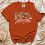 Orange Comfort Colors t-shirt with "MRS just married" text and leopard print.