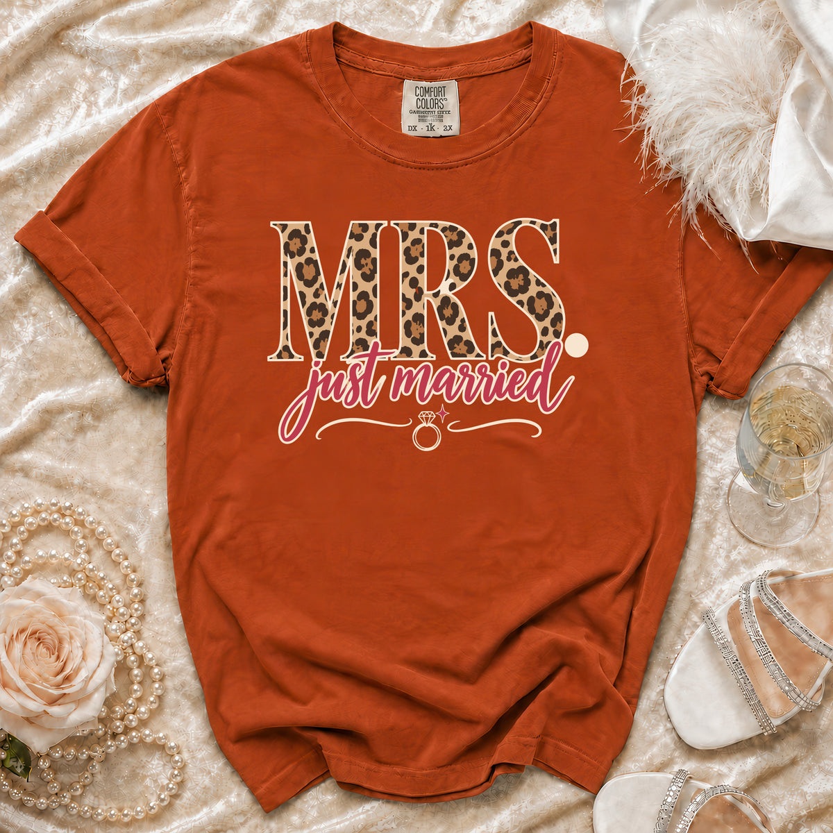 Orange Comfort Colors t-shirt with "MRS just married" text and leopard print.