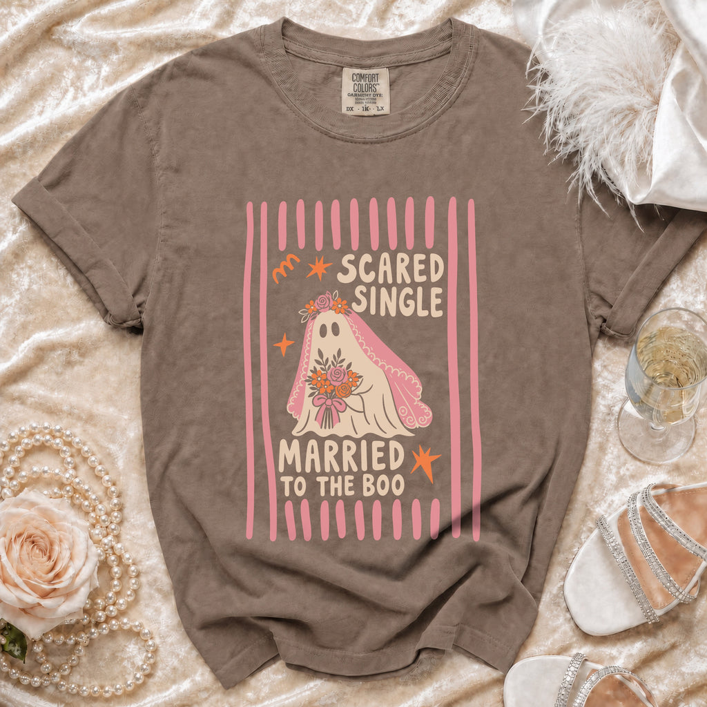 Brown Comfort Colors t-shirt with "Scared Single Married to the Boo" ghost graphic.