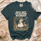 T-shirt with "HOLY SHIT I'M GETTING MARRIED" text and a bride with forest animals.