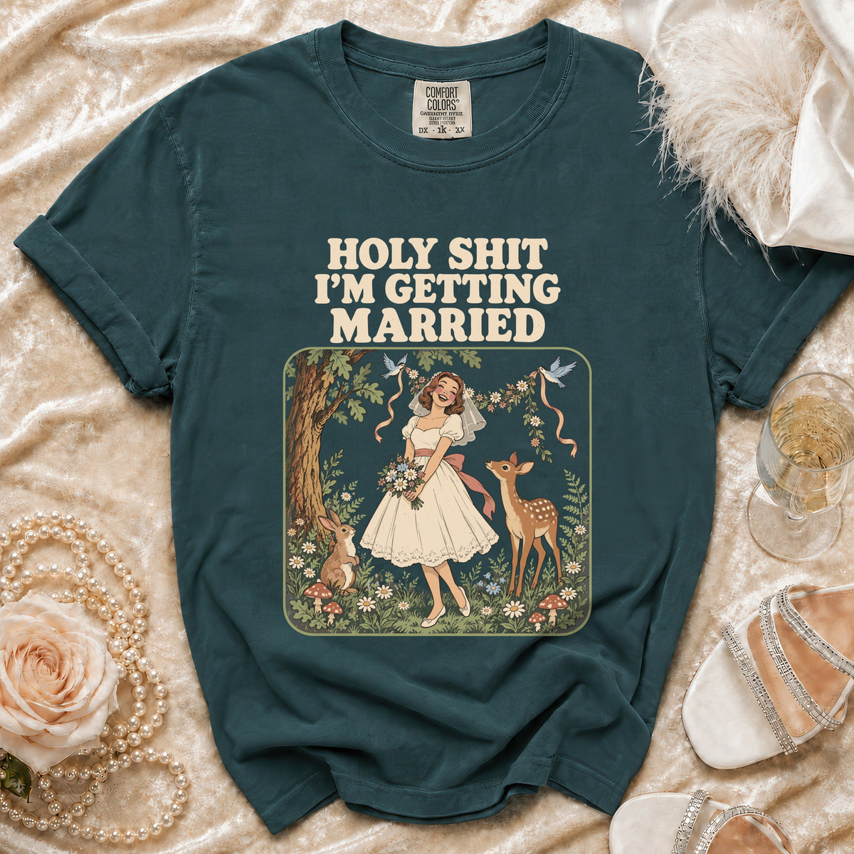 T-shirt with "HOLY SHIT I'M GETTING MARRIED" text and a bride with forest animals.