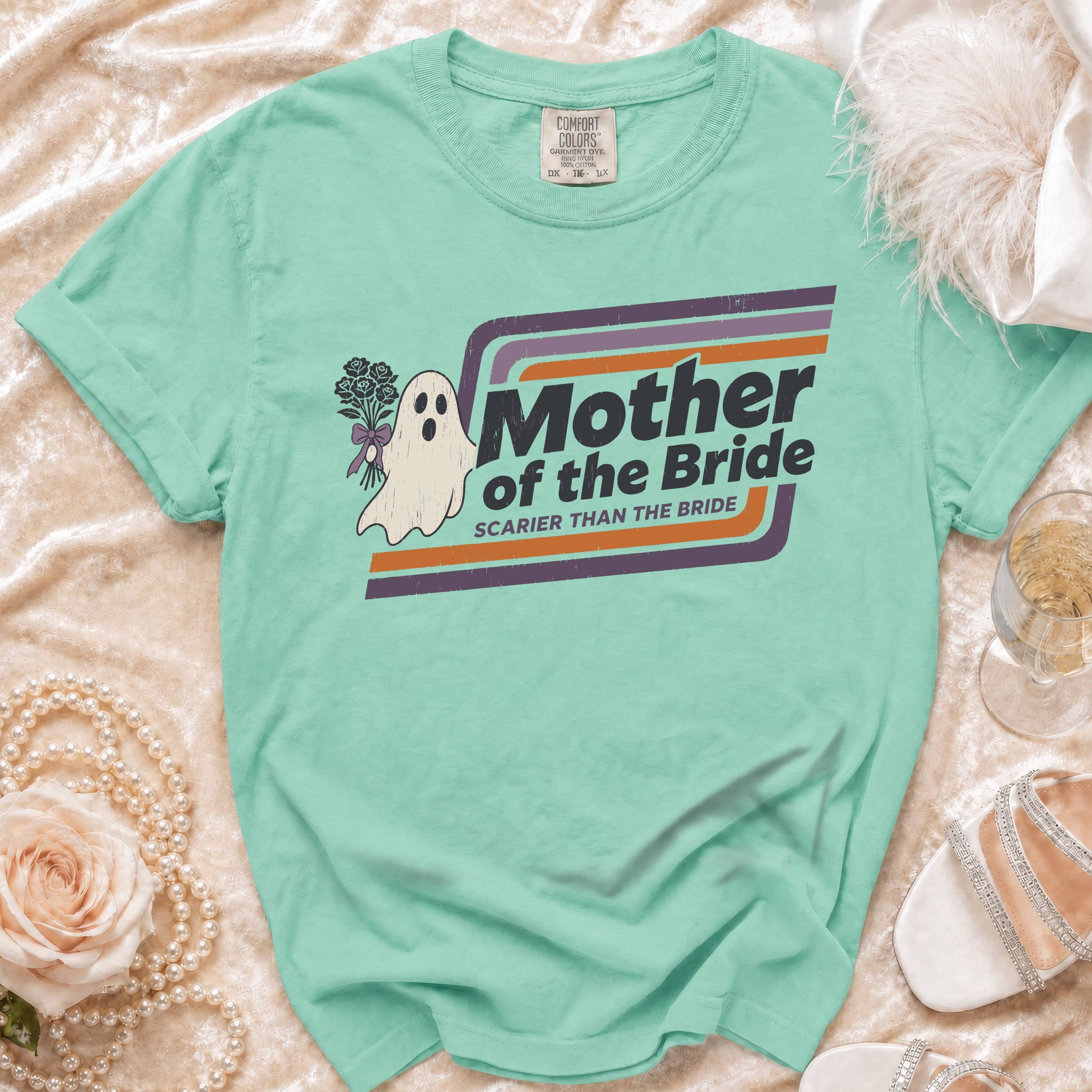 Mint green t-shirt with ghost graphic, "Mother of the Bride" and "Scarier Than the Bride" text.