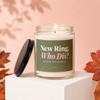 Glass candle with "New Ring, Who Dis? Excuse The Sparkle" text, lit wick.