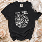 Black t-shirt with "Spooky Bride Club Surviving Weddings & Deadlines One Meltdown" graphic.
