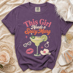 Purple t-shirt with "This Girl Needs a Spicy Marg" and margarita graphic.