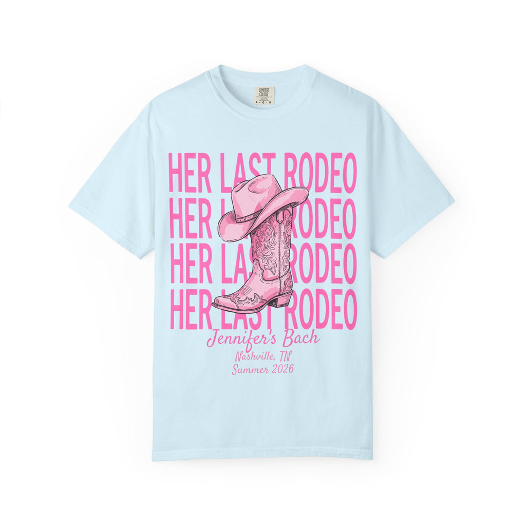 Pale blue t-shirt with "Her Last Rodeo" and cowboy boot design.