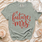 Sage green t-shirt with red "future mrs" text and hearts.