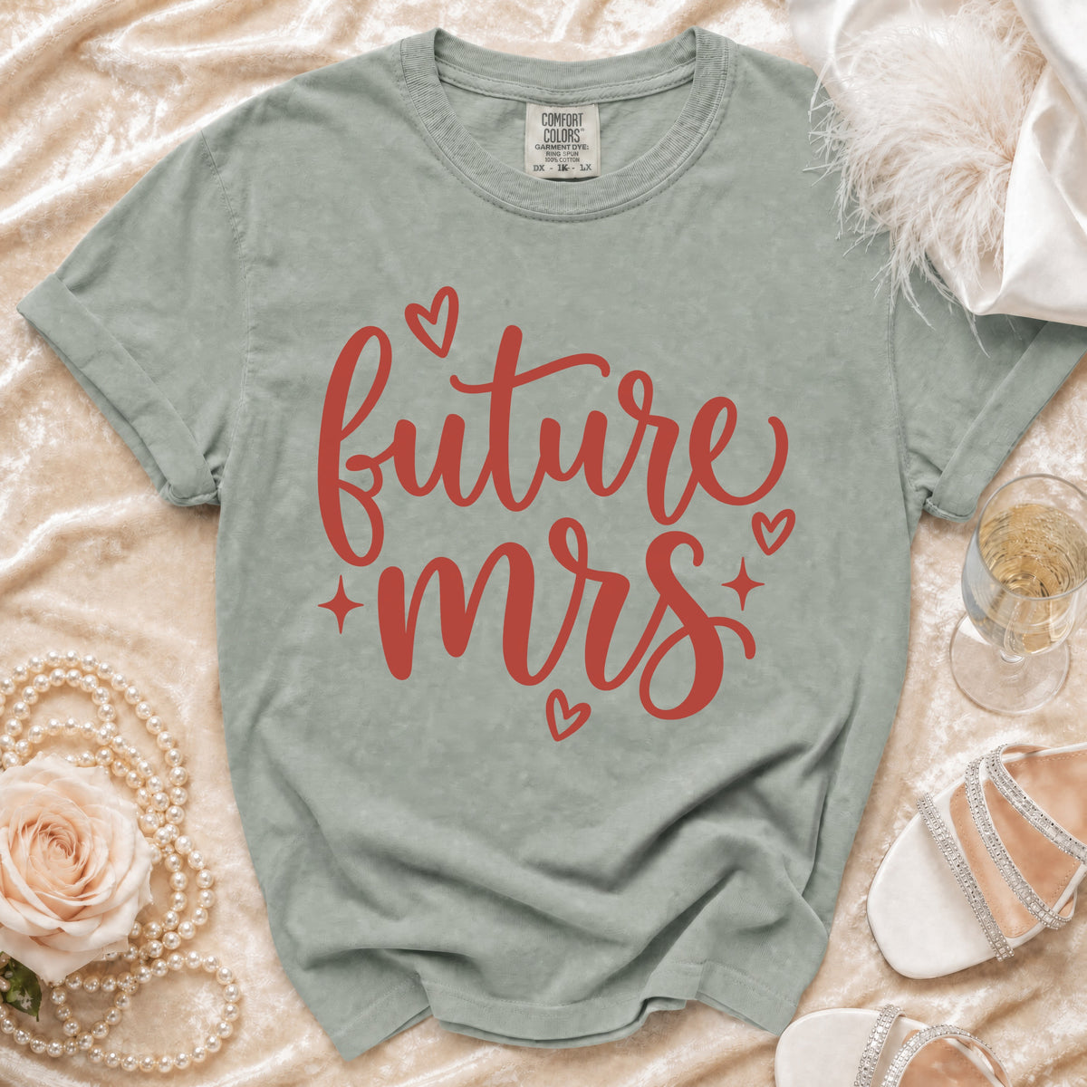 Sage green t-shirt with red "future mrs" text and hearts.