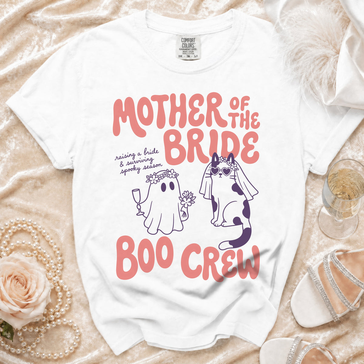 White t-shirt with "Mother of the Bride Boo Crew" text and Halloween-themed ghosts and cats.