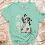 Mint green t-shirt with skeleton bride and groom dancing, text "Til Death Do Us Part".