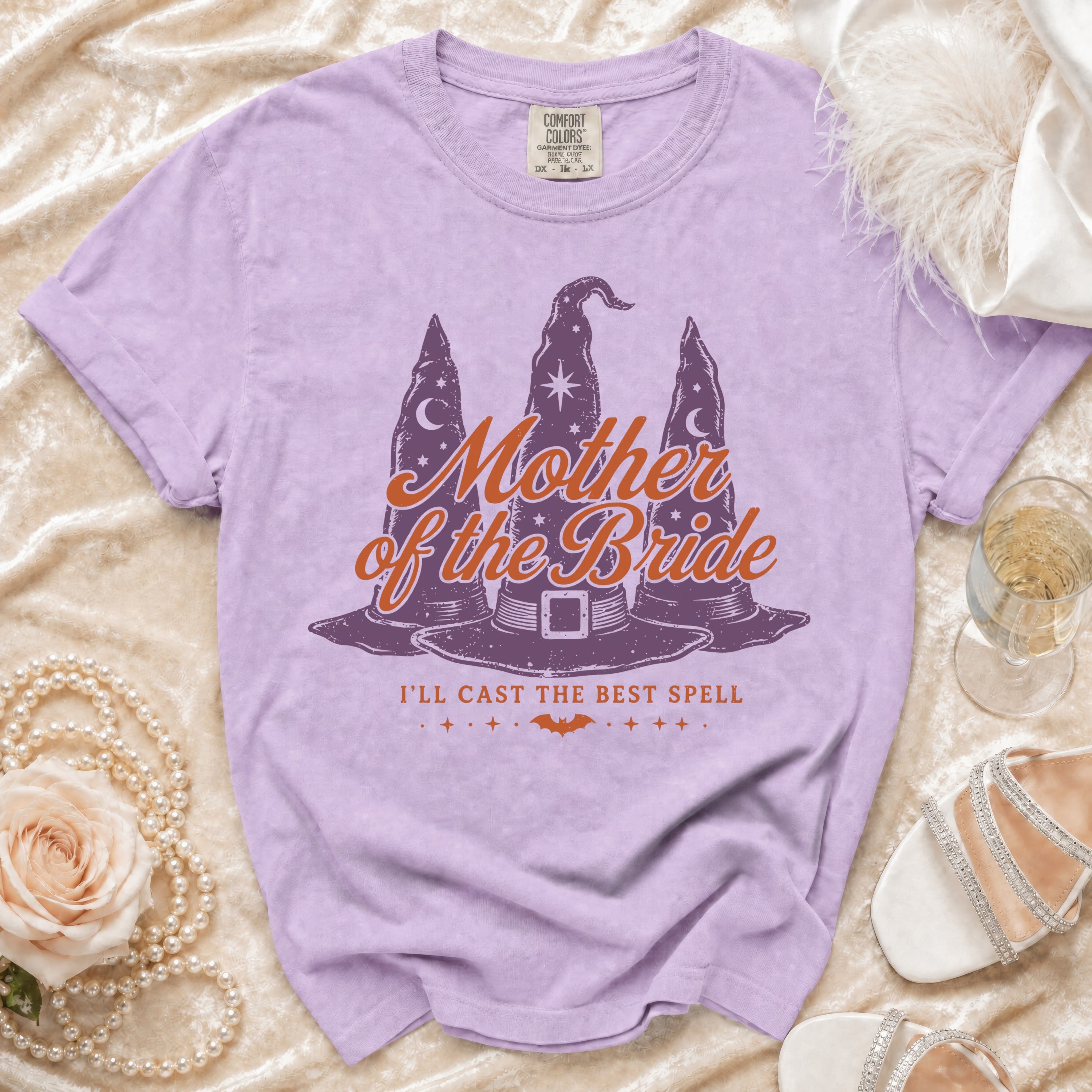Purple t-shirt with "Mother of the Bride" and witch hats graphic.