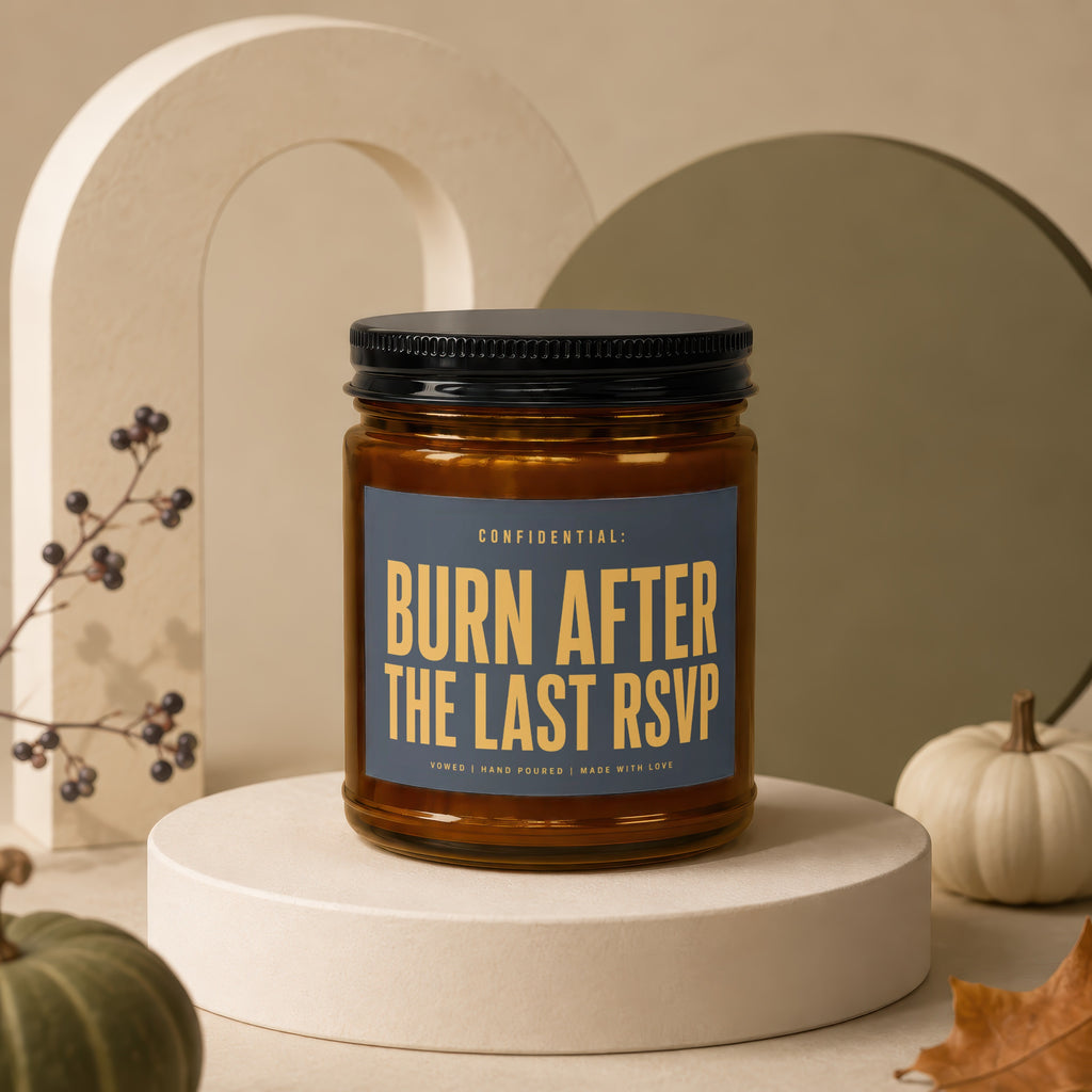 Candle with label "Burn After The Last RSVP" and "Vowed | Hand Poured | Made With Love".