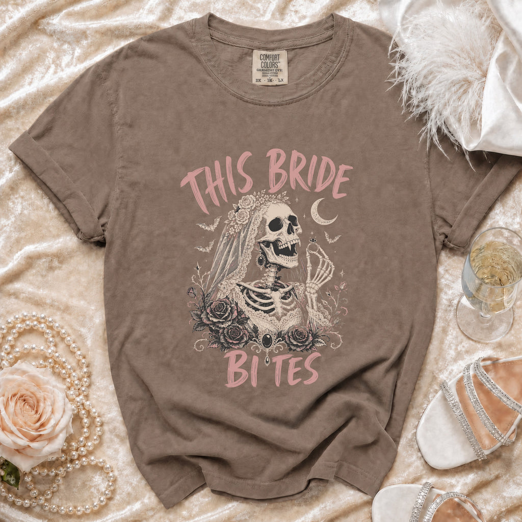 Brown t-shirt with skeleton bride graphic and text "THIS BRIDE BITES".