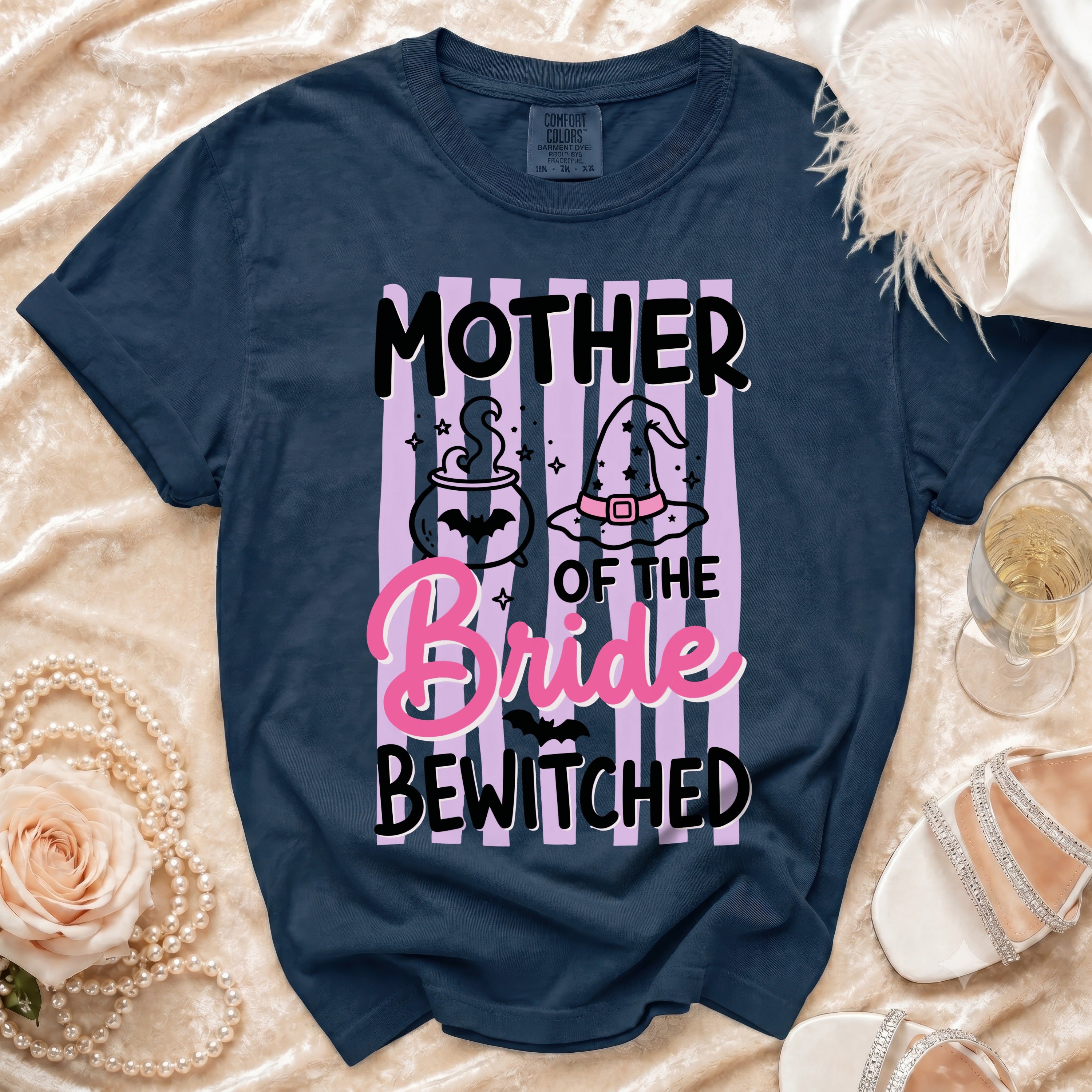 "Mother of the Bride Bewitched" graphic tee with witchy cauldron and hat design.