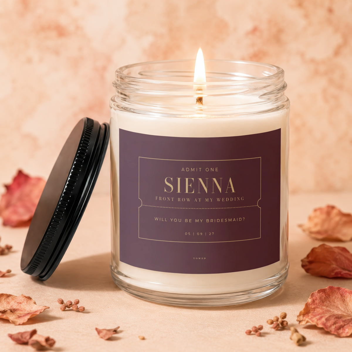 Candle with "Sienna Front Row at My Wedding Will You Be My Bridesmaid?" label.