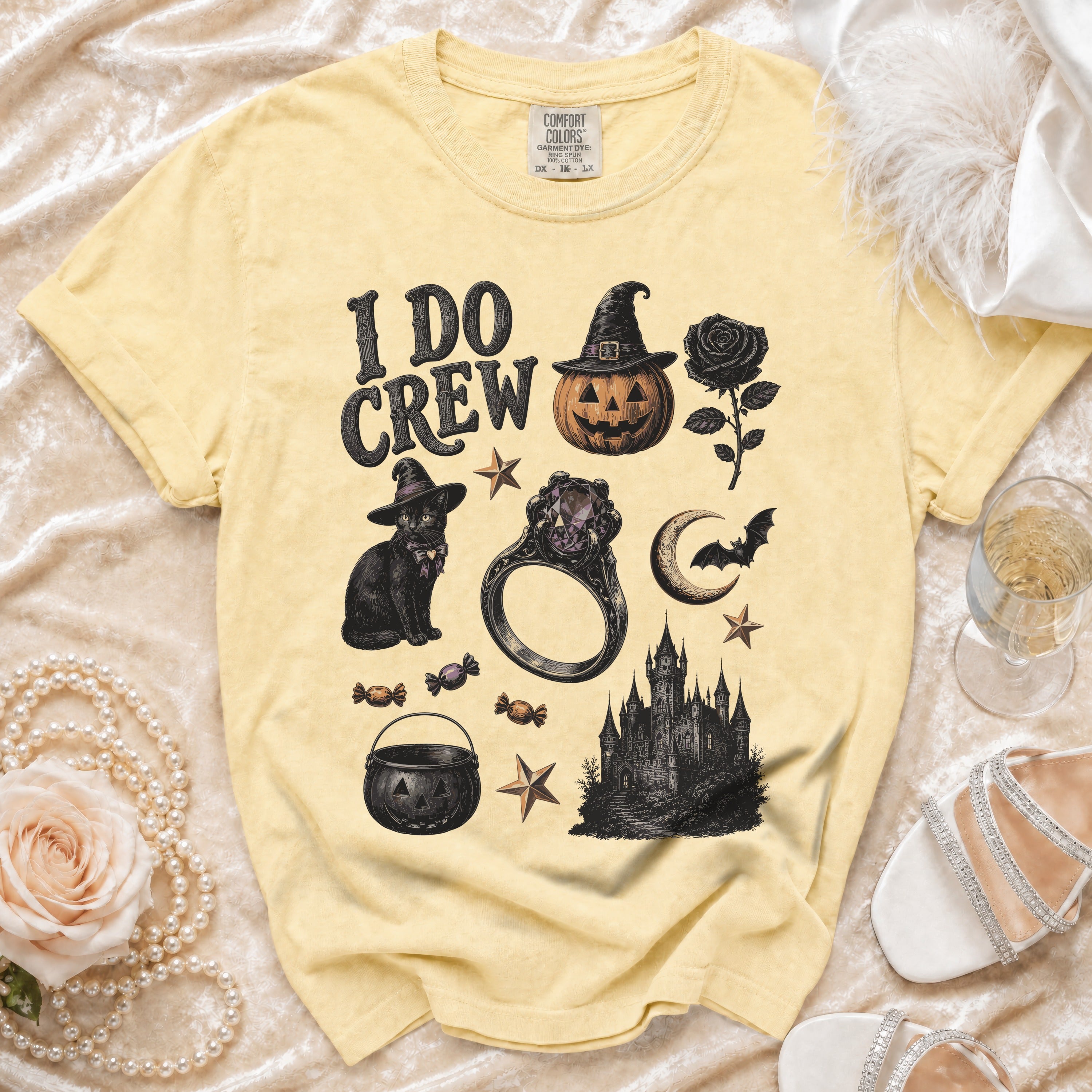 Yellow t-shirt with "I DO CREW" text and Halloween-themed graphics.