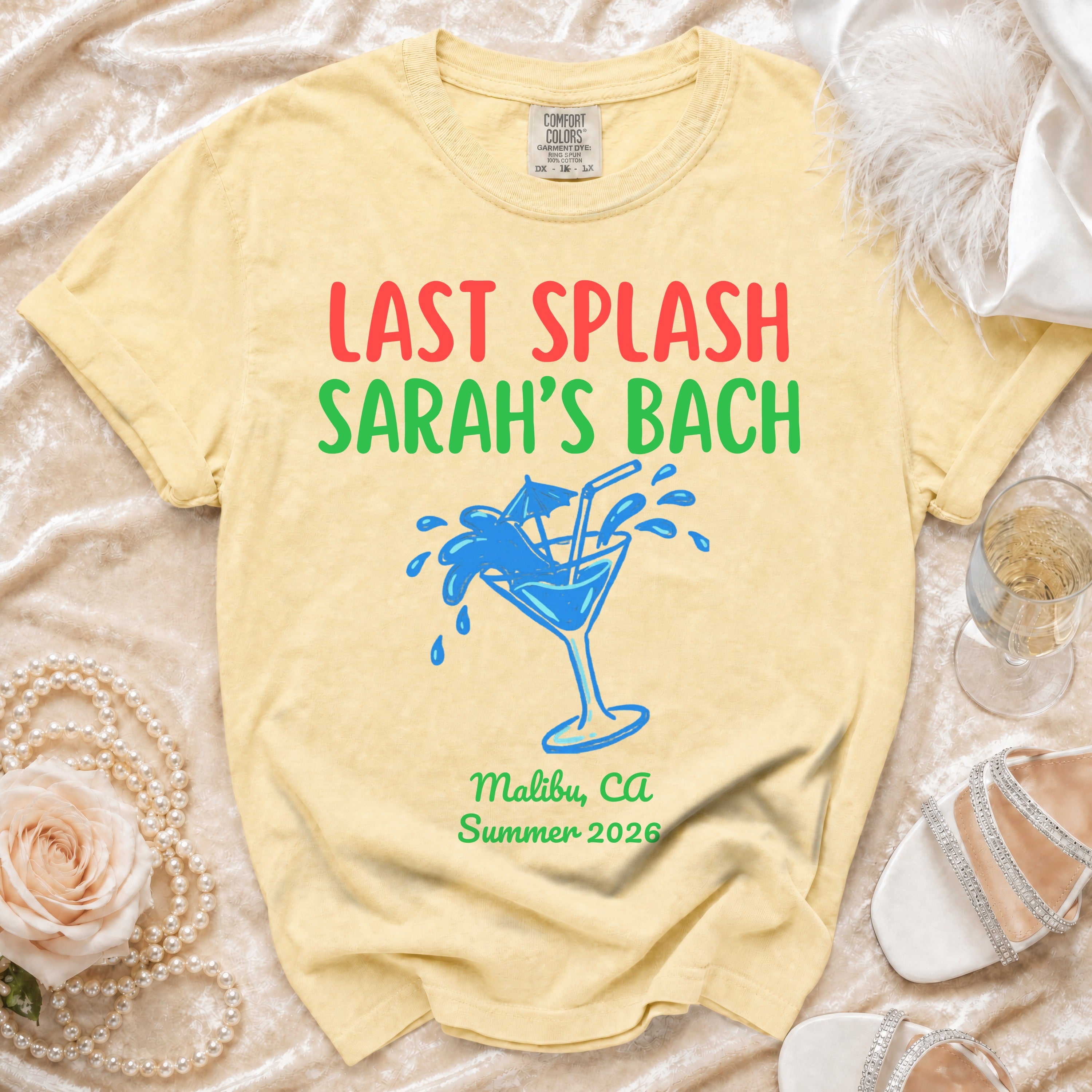 Yellow t-shirt with "Last Splash Sarah's Bach Malibu, CA Summer 2026" text and graphics.