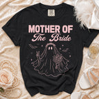 Black t-shirt with pink text "MOTHER OF The Bride" and a ghost bride graphic.