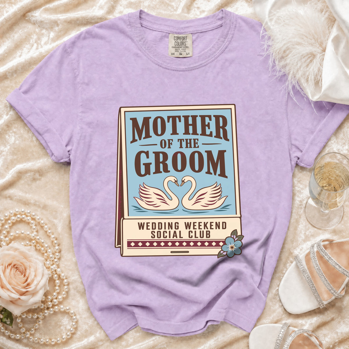 Lavender t-shirt with "Mother of the Groom Wedding Weekend Social Club" graphic and swans.