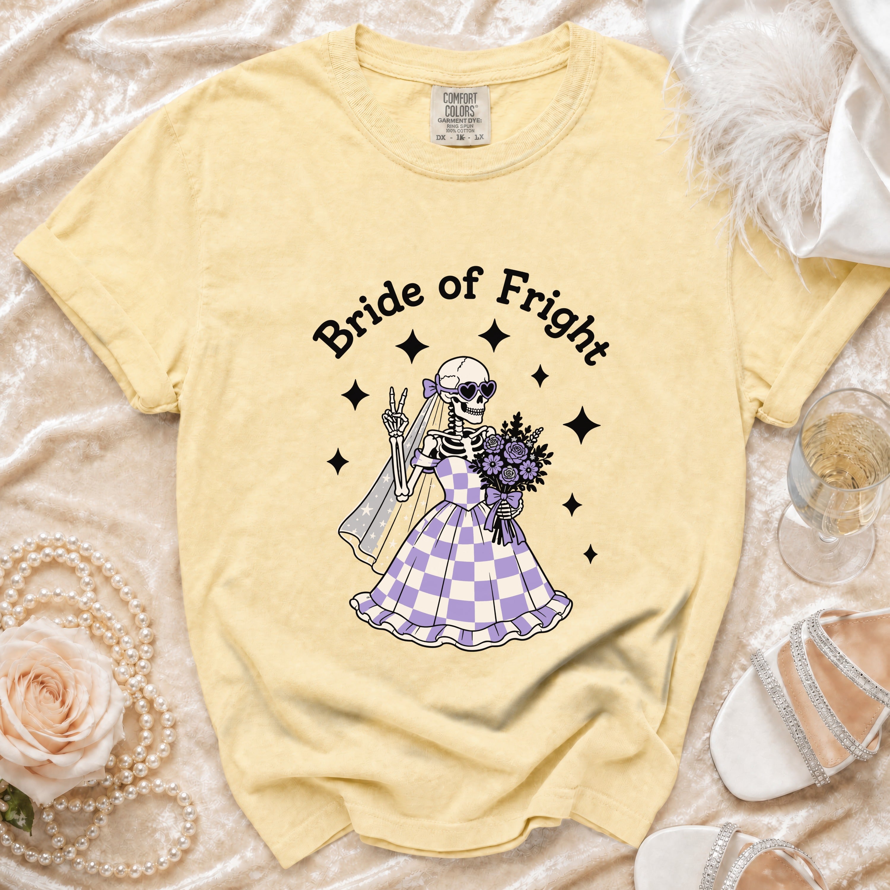 Yellow t-shirt with a skeleton bride graphic and "Bride of Fright" text.