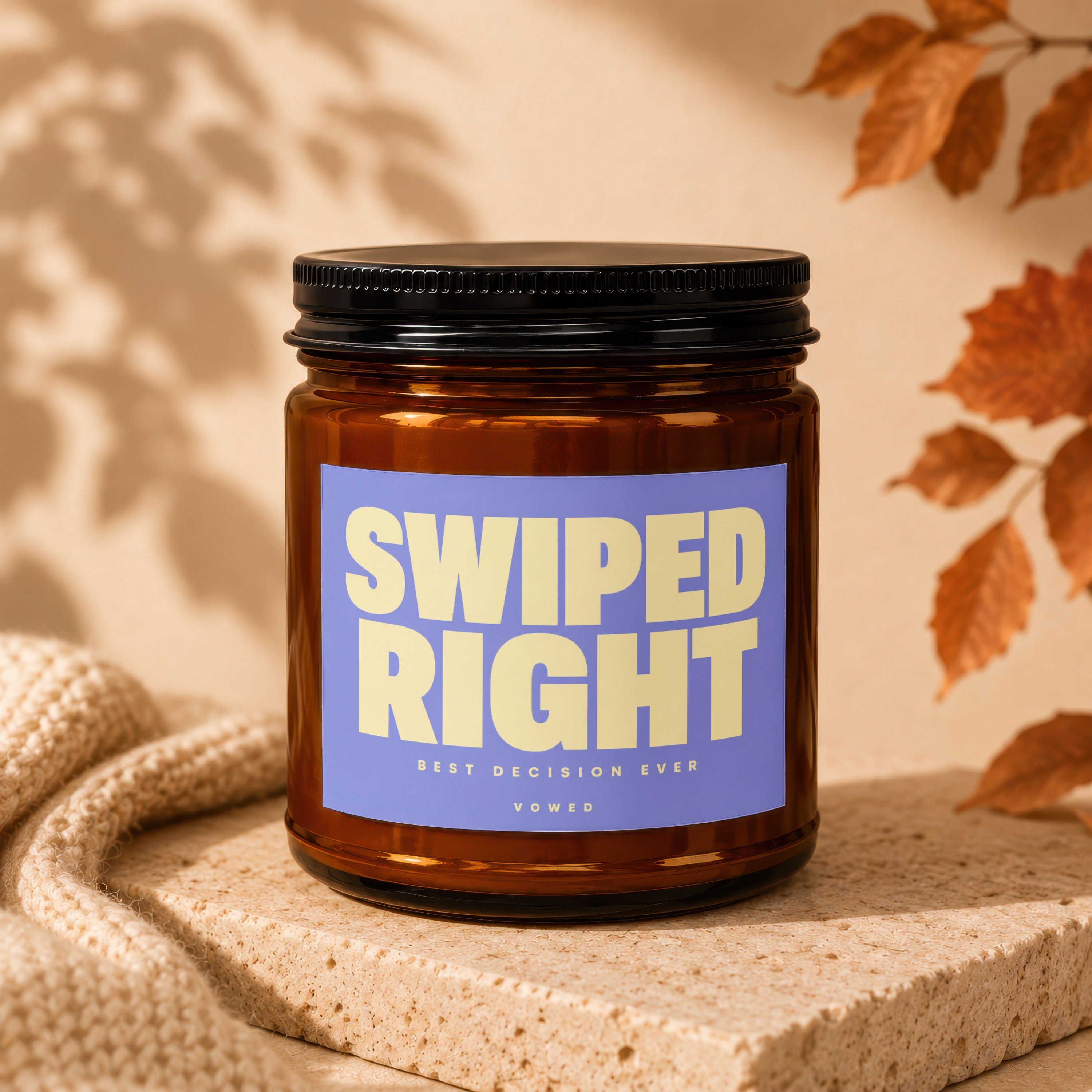 Amber jar candle with "SWIPED RIGHT BEST DECISION EVER VOWED" text on a purple label.